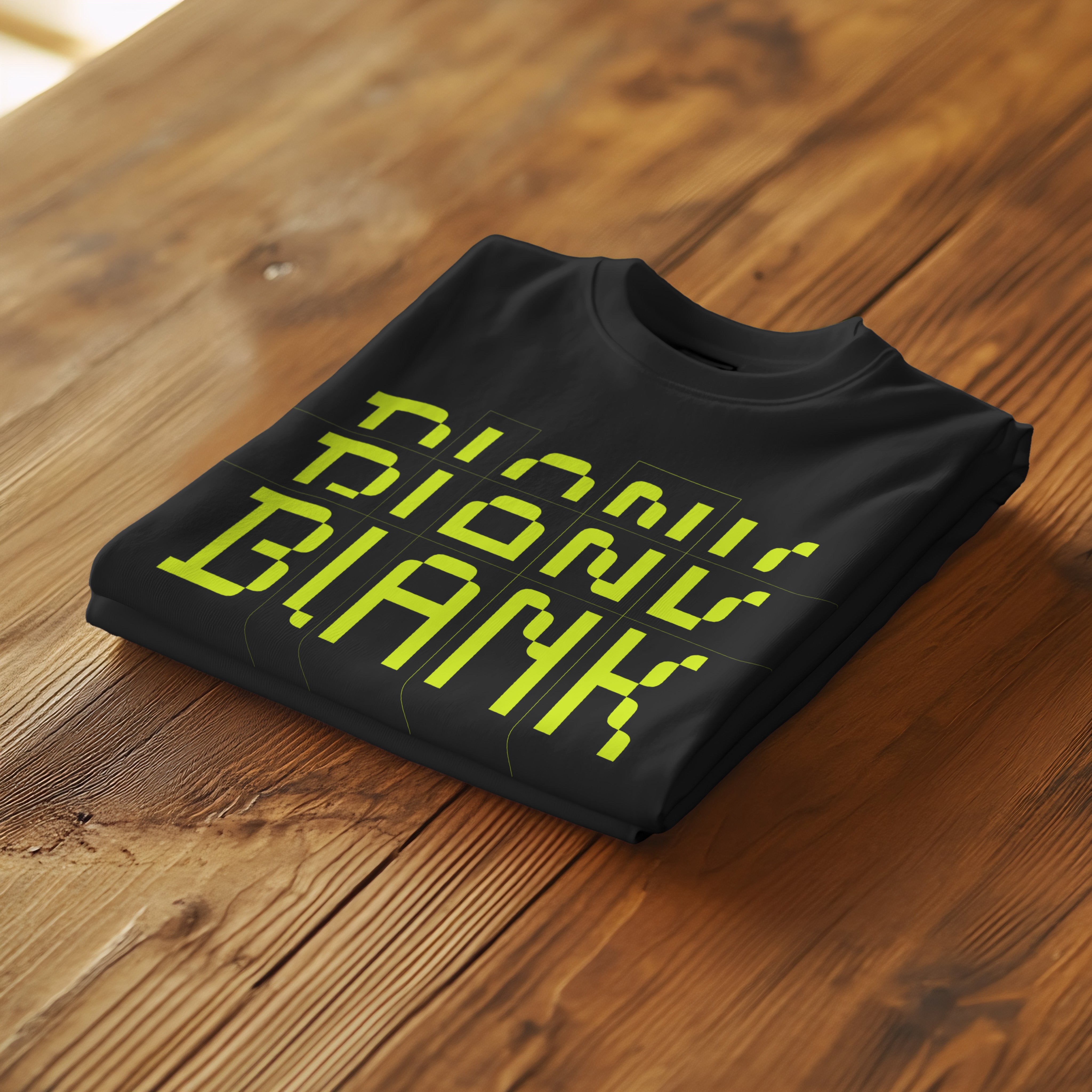 Folded T-Shirt On Table Photoshop Mockup