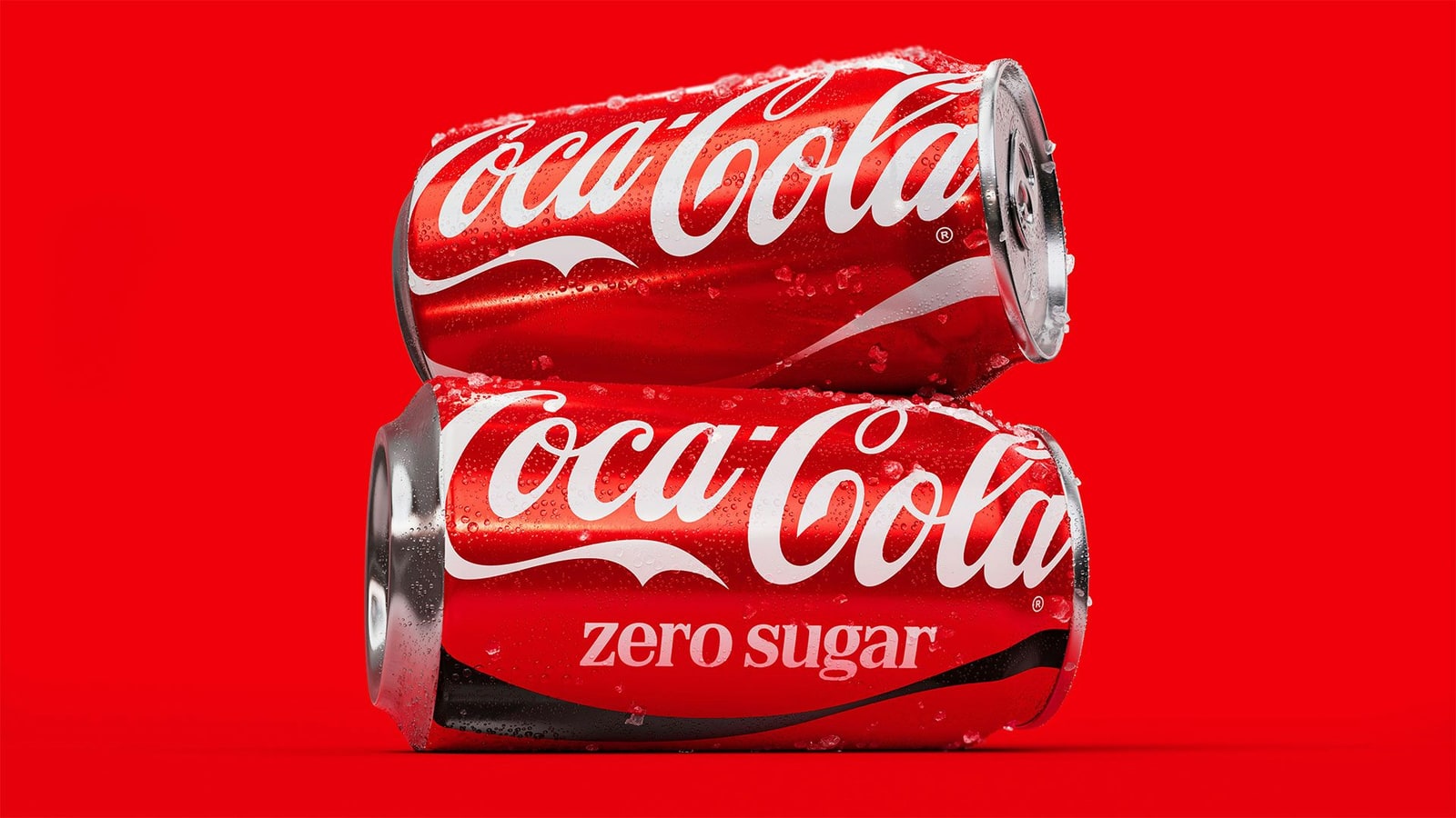 Two Coca-Cola and Coca-Cola Zero Sugar cans against a bold red background, new brand system