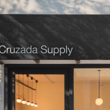 Storefront Sign Mockup - Cruzada Supply 1.png