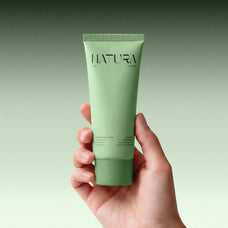 cosmetic-tube-mockup-in-hand-pixelbuddha-2.jpg