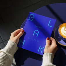 Hardcover Book in Hand Mockup
