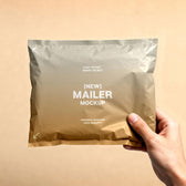 Mailer in Hand Mockup
