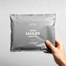 mailer-in-hand-mockup-pixelbuddha-4.jpg