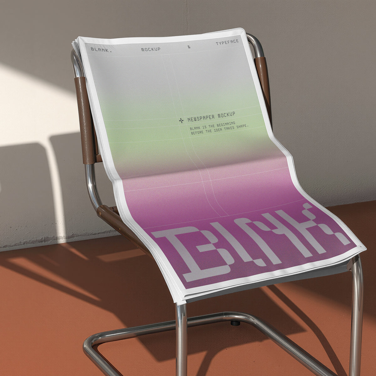 newspaper-draped-over-chair-blank-studio-1.jpg