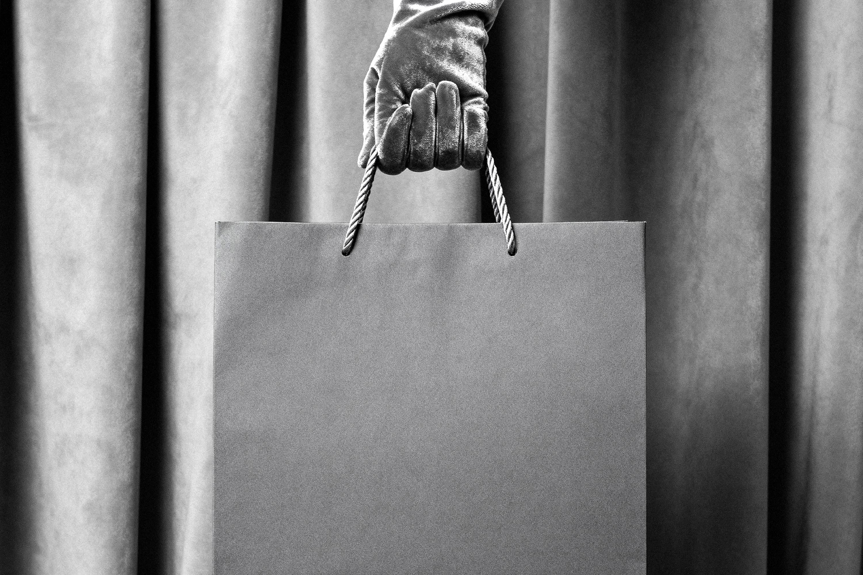 paper-bag-mockup-in-hand-pixelbuddha-2.jpg