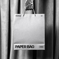 paper-bag-mockup-in-hand-pixelbuddha-3.jpg