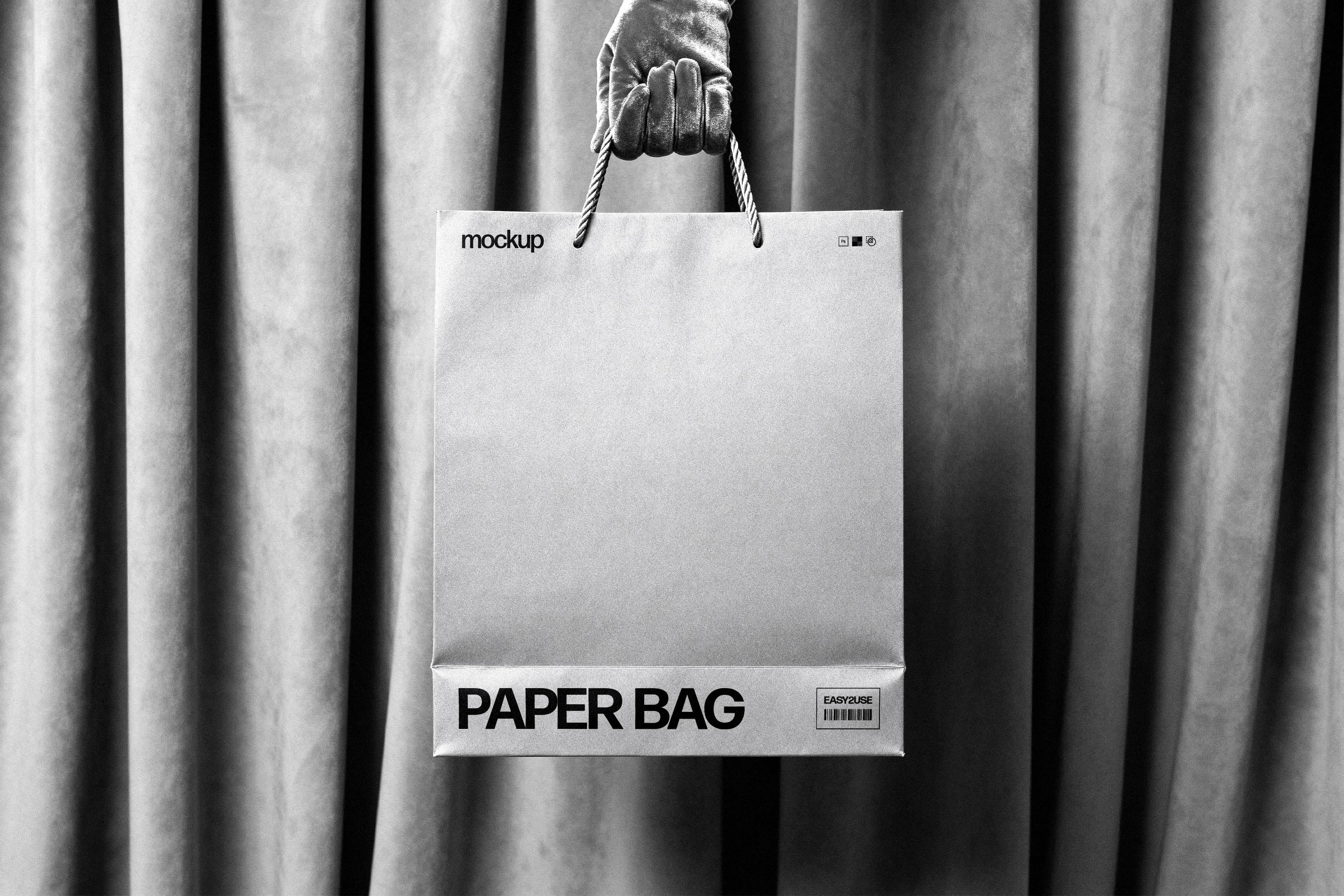 paper-bag-mockup-in-hand-pixelbuddha-3.jpg