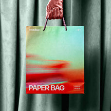 paper-bag-mockup-in-hand-pixelbuddha-4.jpg