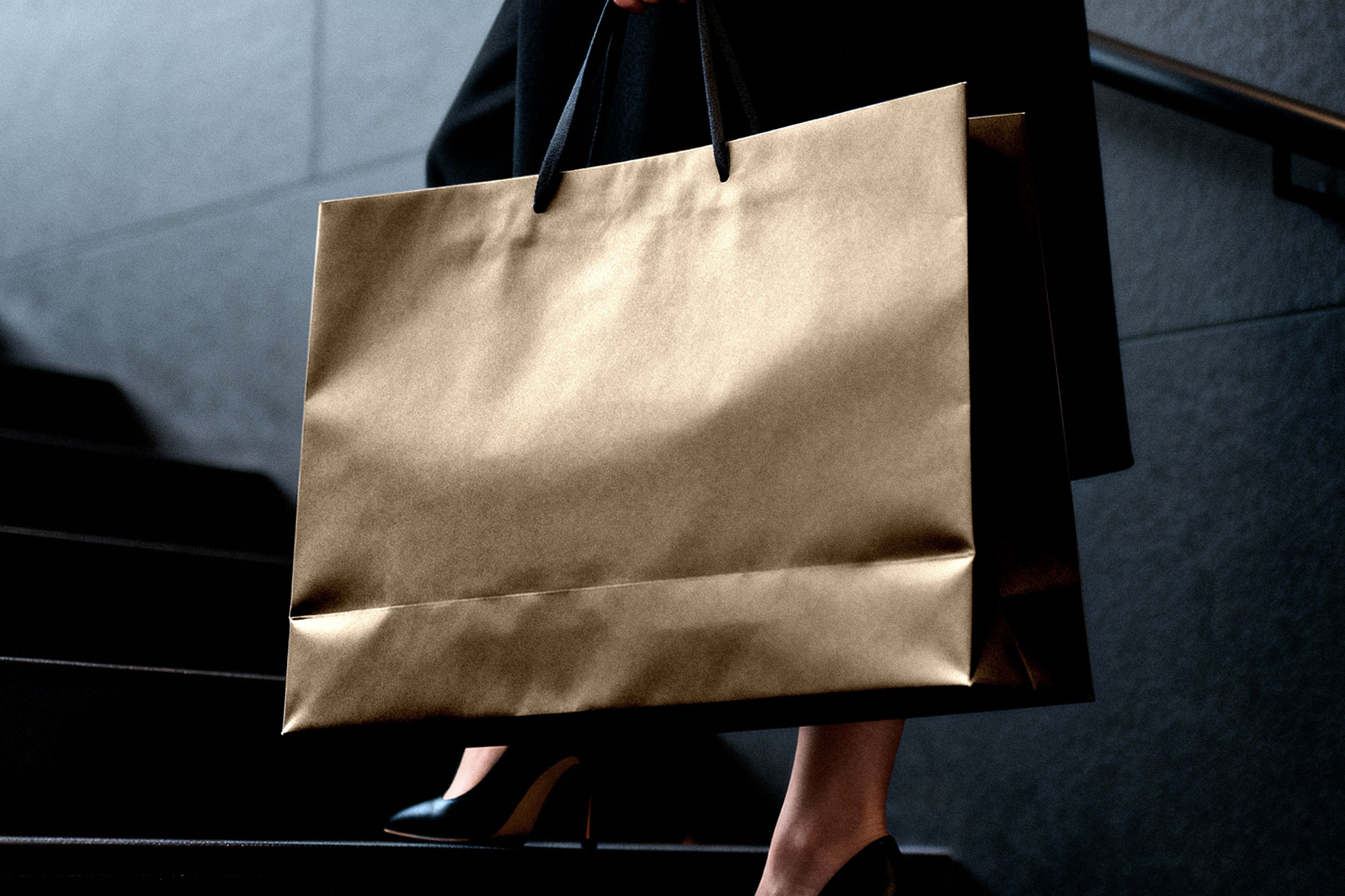 shopping-paper-bag-mockup-with-ribbon-handles-pixelbuddha-2.jpg