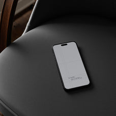 smartphone-mockup-upholstered-chair-blank-studio-2.jpg