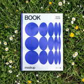 Top View Book Mockup on Grass